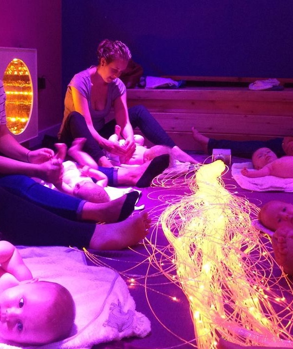 I ma massing Lucas at baby massage. You can see sensory lights around us