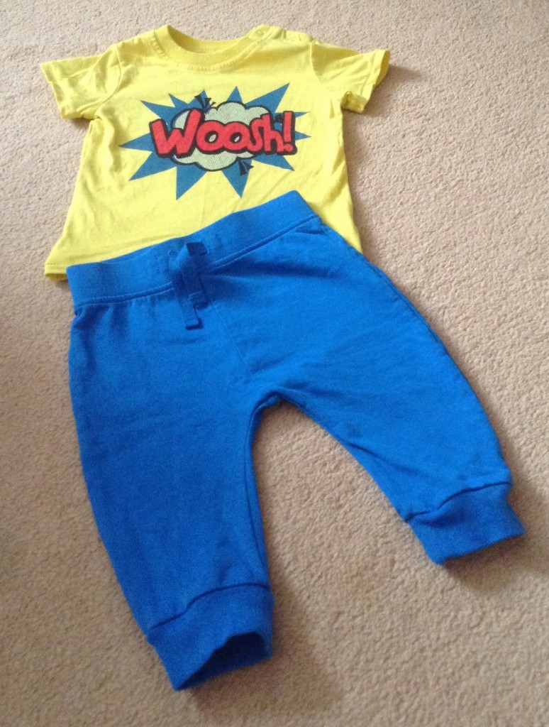 baby fashion, bright blue jogging pants and yellow t shirt with a red woosh in the middle and blue pattern