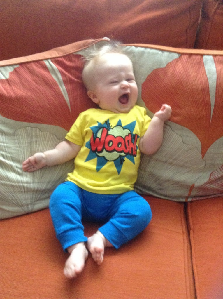 baby fashion, bright blue jogging pants and yellow t shirt with a red woosh in the middle and blue pattern