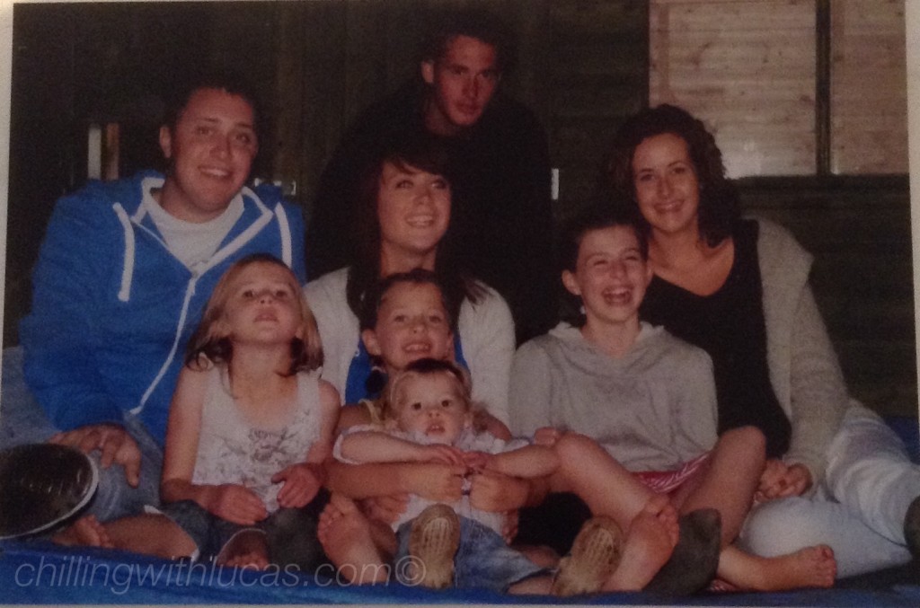 Blogtober #2 a photo on me and my brother sat on a trampoline with 6 cousins