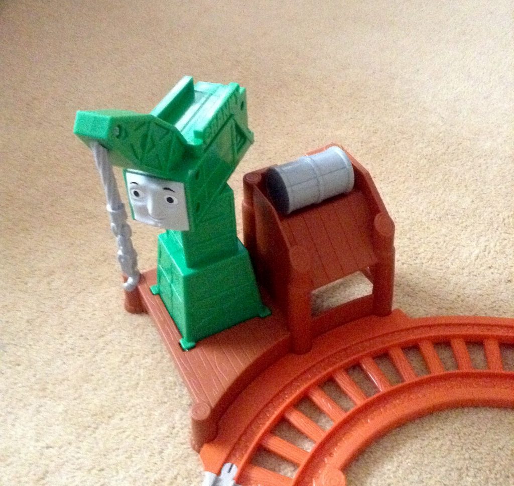 Thomas & Friends My First All Around Sodor, Cranky is green with a grey barrell and brown track