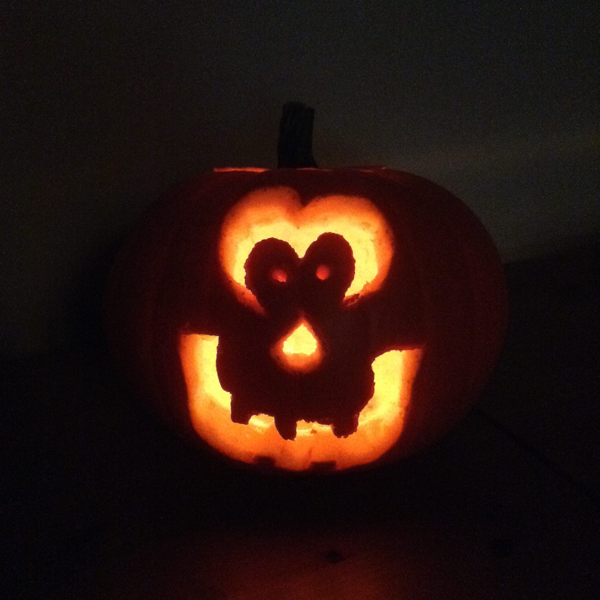 Halloween. Lit pumpkin in the dark