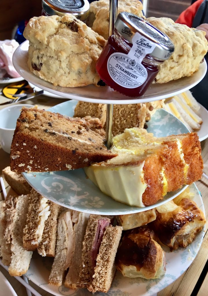 Lakeside Coffee House birthday afternoon tea a stand of cakes, scones, crisps and sandwiches