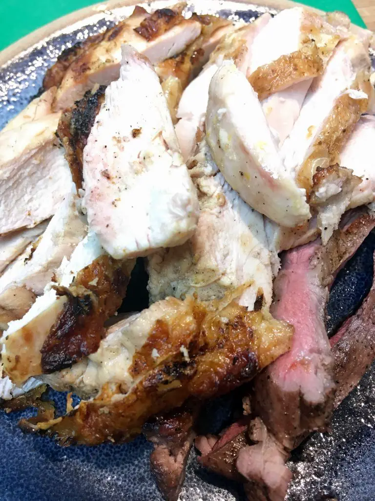 BBQ masterclass a plate of cut up steak and chicken