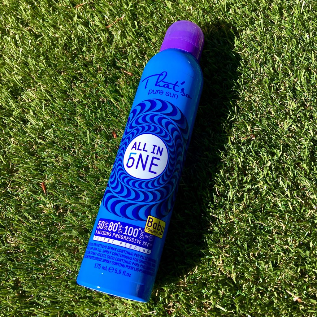 Father’s Day gift ideas a photo of a blue and purple can of sun cream against grass