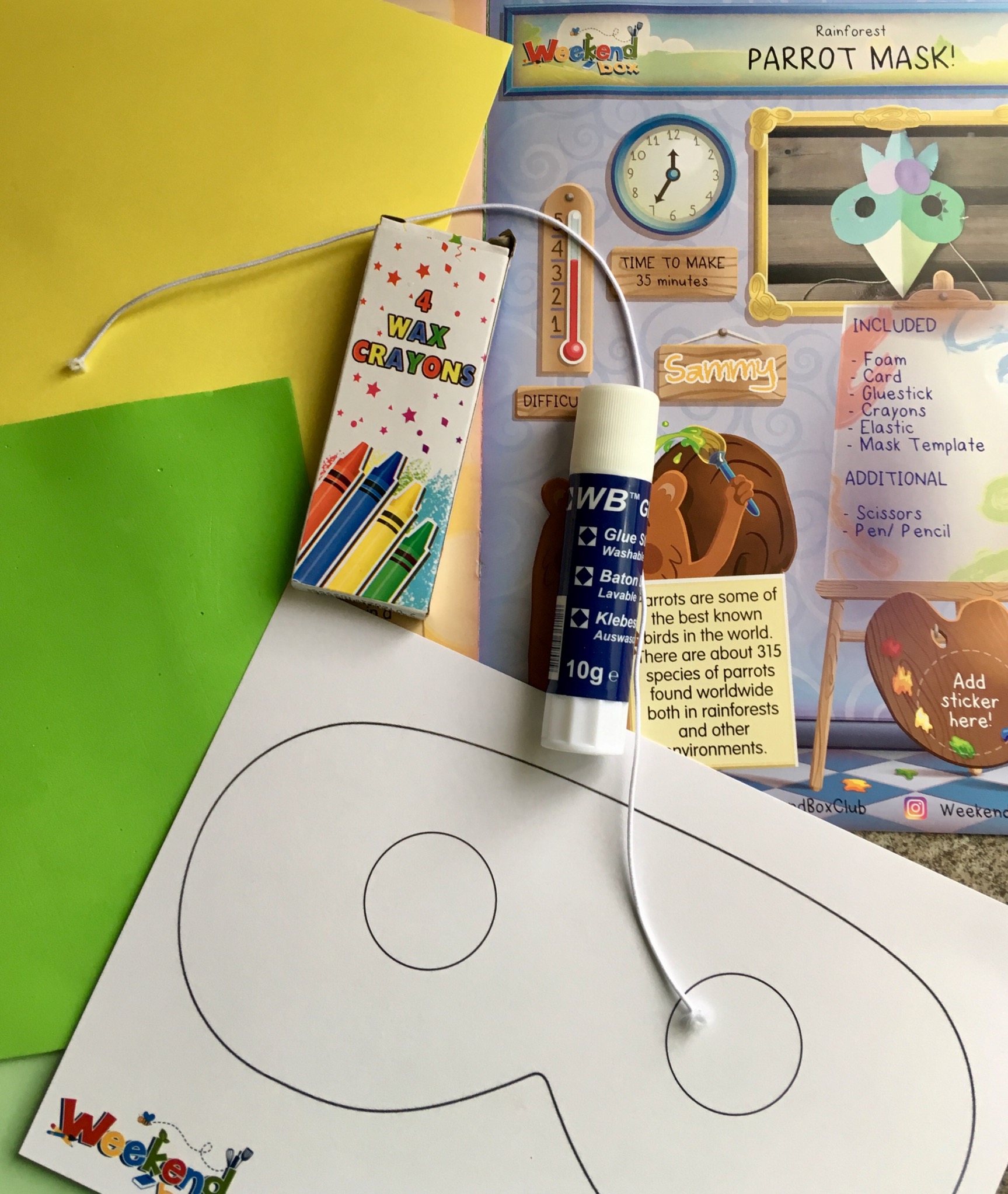 Children’s subscription box for only £1. Coloured paper, glue stick, string, the mask template to make the parrot mask