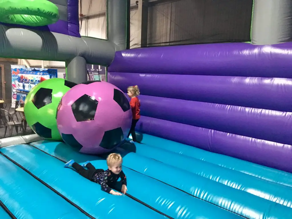 Air Unlimited Burnley review. Lucas and S in the inflatable basketball and football area with giant footballs 