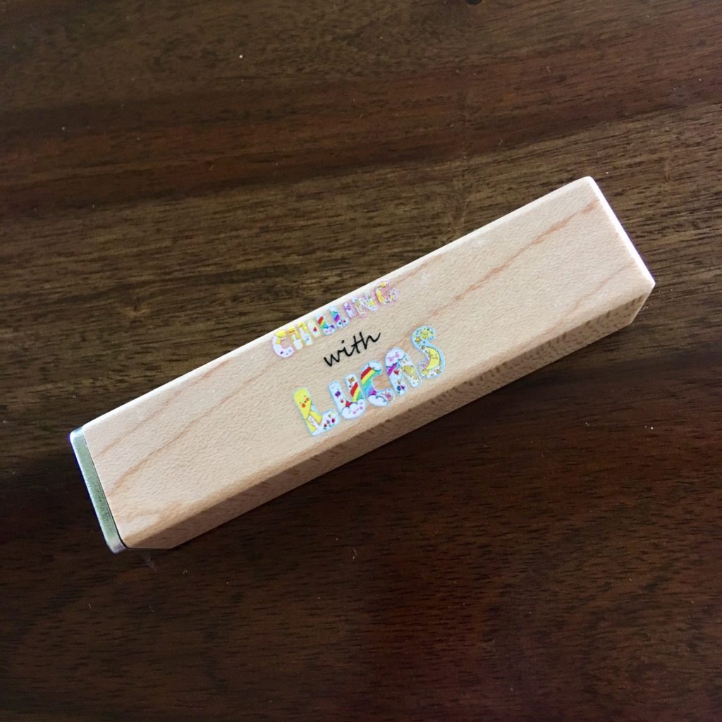 Personalised power pack light wood with my Chilling with lucas logo on