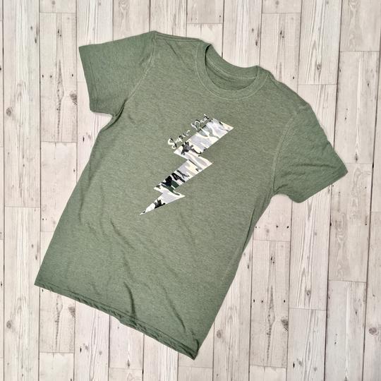 Green Tshirt with a camo lightening bolt on it with small writing saying super dad
