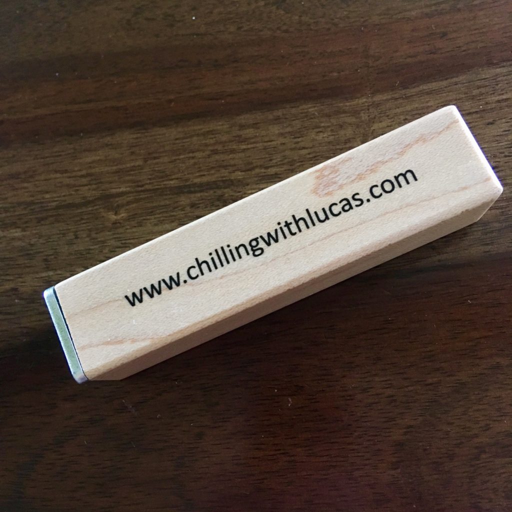 Personalised power pack light wood with my https://chillingwithlucas.com written on it in black