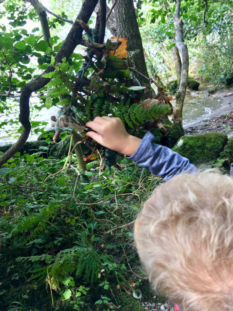 Lucas doing forest weaving 
