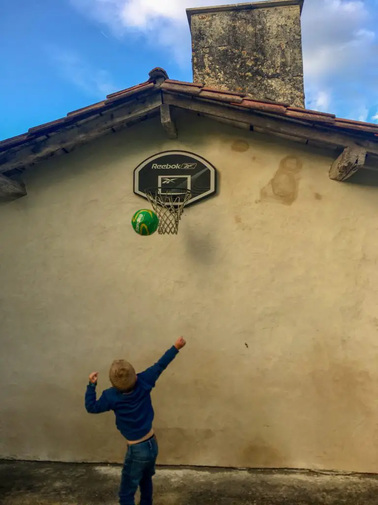 Lucas playing basketball 