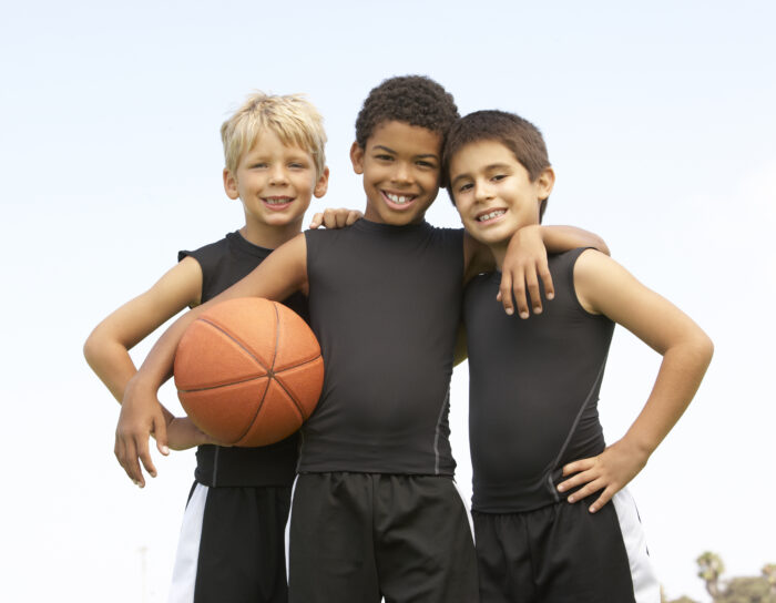 Young Boy Playing Basketball