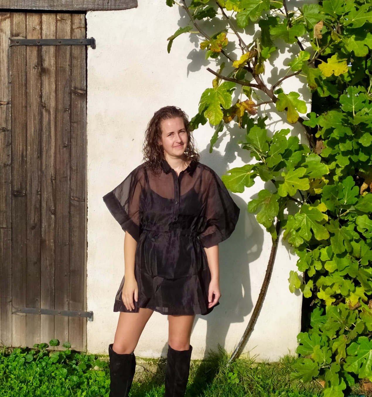 I’m wearing a Femme Luxe black shirt dress