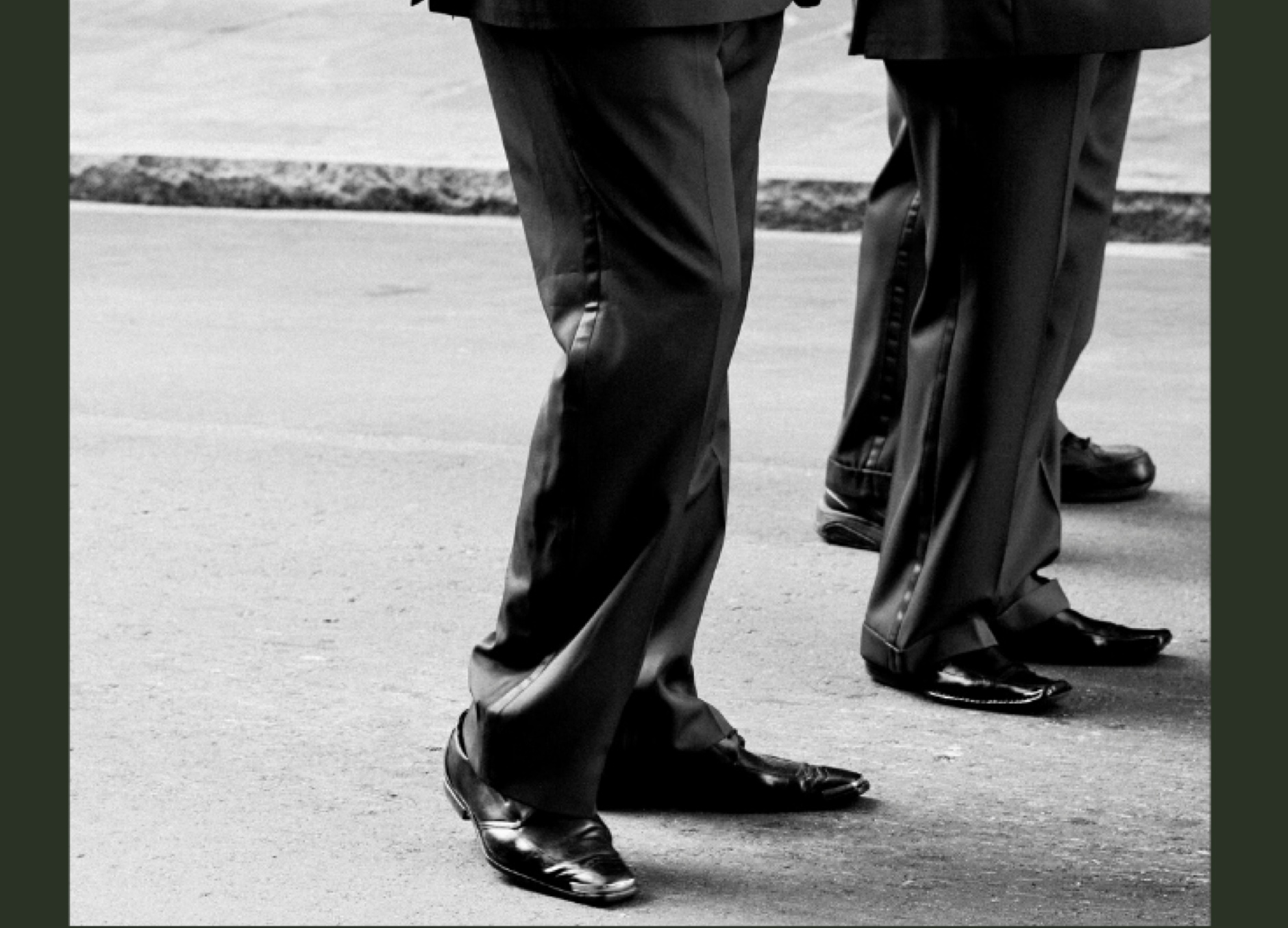 mens legs in trousers and black shoes