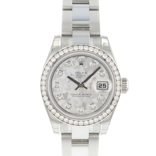 silver rolex watch with diamond surround