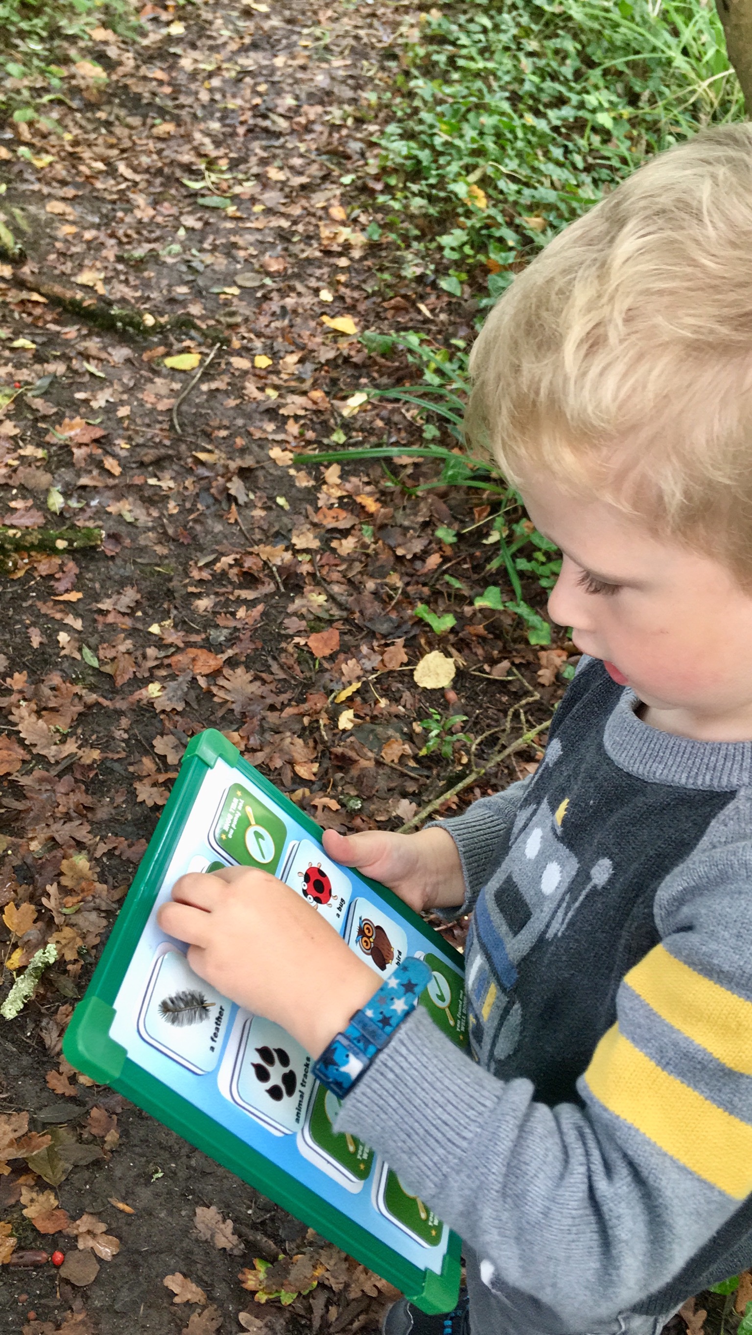 Lucas on a scavenger hunt with his magnetic board