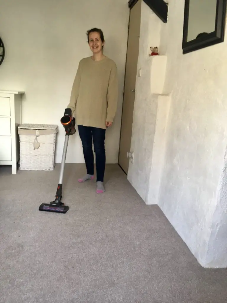 Me using the Vonhaus handheld vacuum