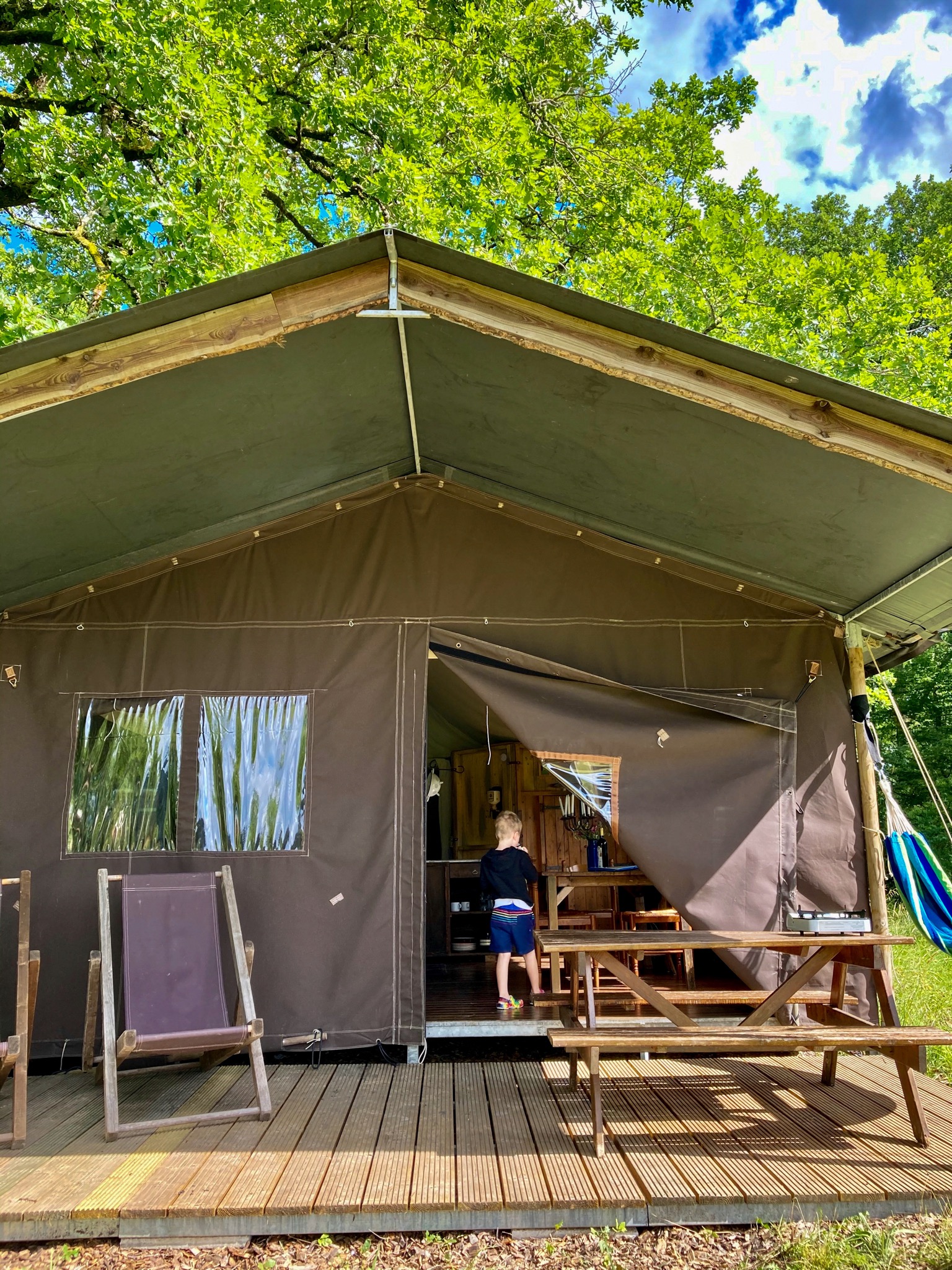 Brown canvas glamping tent at a Featherdown site