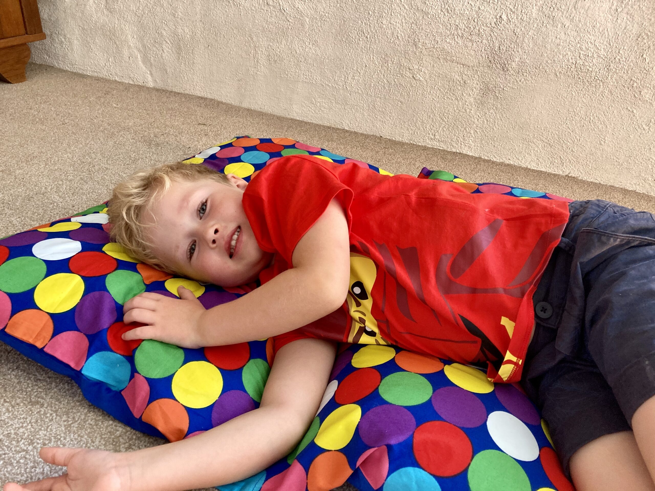 Lucas led on the bright spotty secret bed