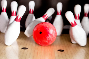 Bowling ball and skittles
