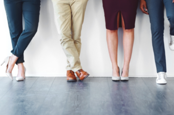 body language photo shows 4 pairs of legs in different positions