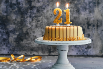 cake with candles saying 21