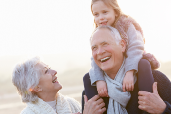 grandparents with a granddaughter