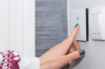 lady turning the lights off