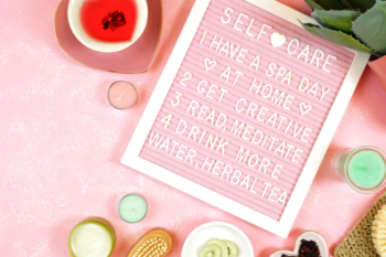 pink background with a pin board saying self care rituals