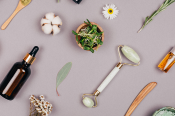 healthy skincare, skincare bottles, face rollers