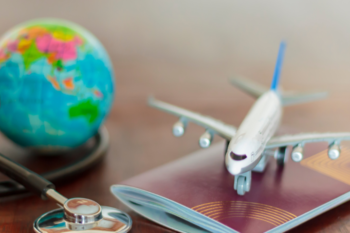 globe, plane, passport and stethoscope