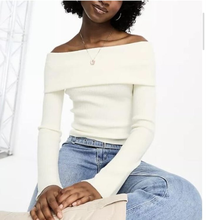 white top and light denim jeans