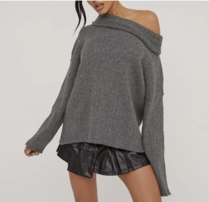 oversized grey jumper and black mini skirt