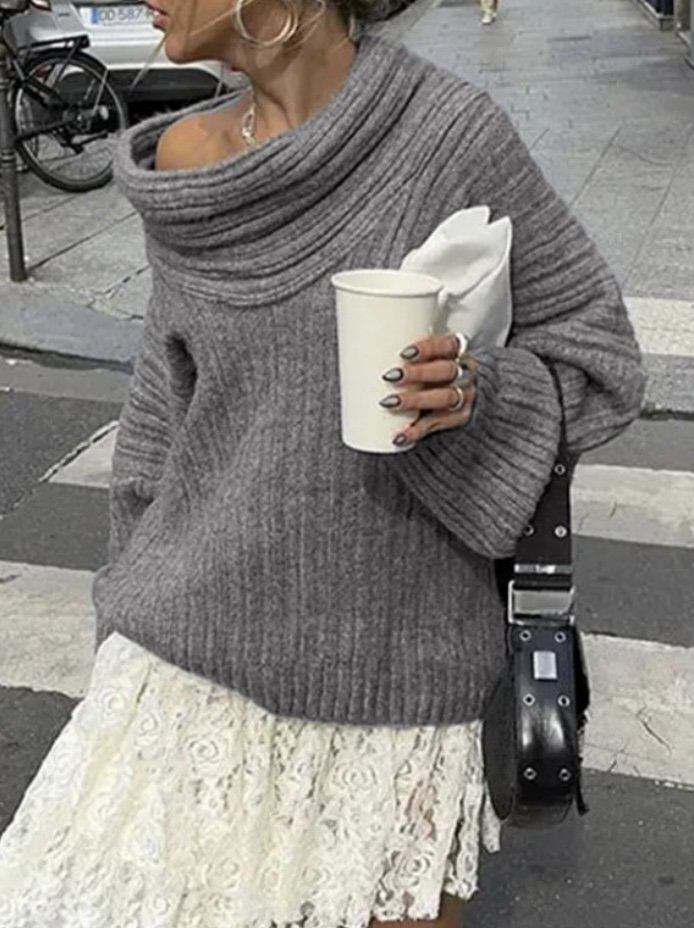 grey jumper and white skirt