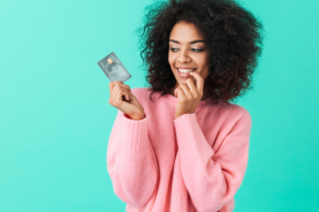 woman-in-20s-holding-credit-card