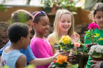 children holding plants