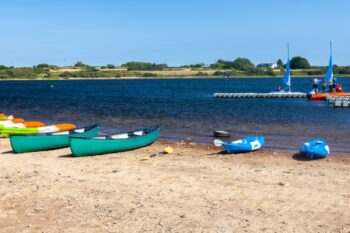 canoes on beach in cornwall
