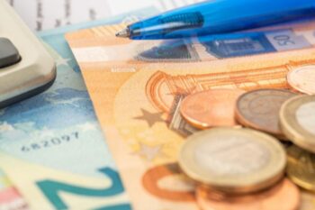 notes and coins in euros