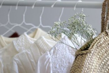 white capsule wardrobe, shirts on clothes rail