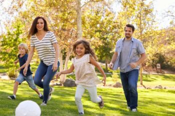 family playing football