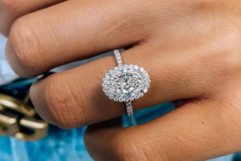 oval diamond ring on hand