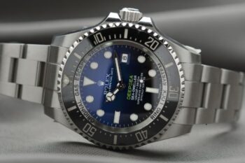 blue and silver rolex watch