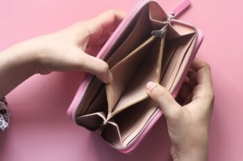 empty purse with pink background