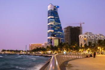 Stunning Dubai skyline with a prominent skyscraper near the beach, capturing the essence of luxury travel and urban exploration in the United Arab Emirates.