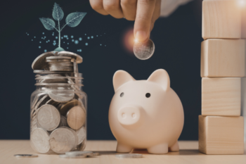 piggy bank ad jar of coins with plant coming out