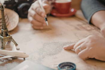 map, toy plane, compass