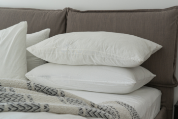 white pillows on bed