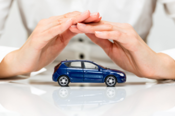 hands over a toy car