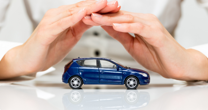 hands over a toy car